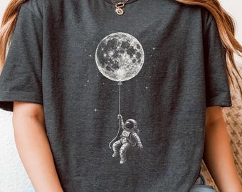Astronaut Moon Balloon T-Shirt, Space Aesthetic Graphic Tee, Cosmic Astronaut Shirt, Galaxy Space Lover Tee, Minimal Space Art Shirt