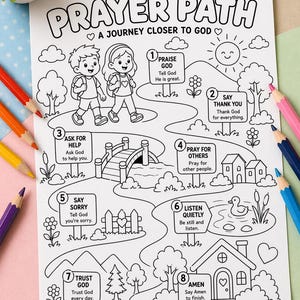 May include: Black and white coloring page titled "Prayer Path" with illustrations of children, a bridge, houses, and a pond. The text includes steps like "Praise God," "Say Thank You," and "Amen." Colored pencils are arranged around the page.