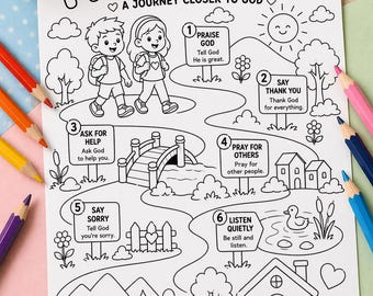 Op de afbeelding: Zwart-wit kleurplaat getiteld "Prayer Path" met illustraties van kinderen, een brug, huizen en een vijver. De tekst bevat stappen als "Praise God", "Say Thank You" en "Amen". Kleurpotloden zijn rond de pagina gerangschikt.