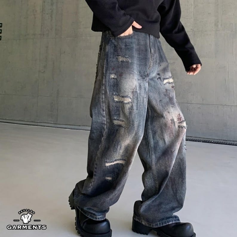 Distressed Denim Jeans | Washed Ripped Wide Leg Pants | Casual Wear | Urban Street Style

Dark washed wide-leg denim jeans with heavy distressed fading and ripped details, featuring a loose straight fit and rugged streetwear style.