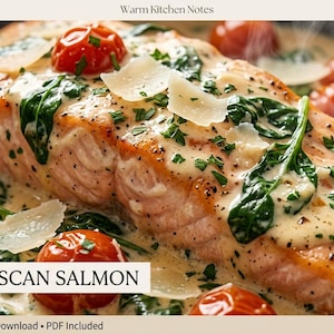 May include: A close-up of Creamy Tuscan Salmon, a dish featuring a cooked salmon fillet in a creamy sauce with spinach, cherry tomatoes, and parmesan cheese. The recipe title is displayed in the image.