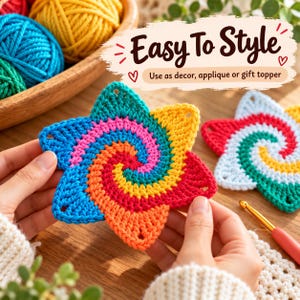 May include: A six-pointed star-shaped crochet motif featuring a spiral pattern in blue, pink, orange, and red yarn. The text "Easy To Style" and "Use as decor, applique or gift topper" is printed above the crochet piece.