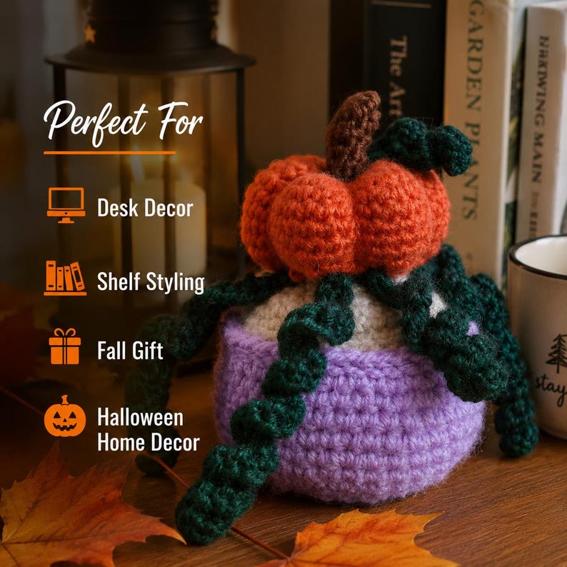 May include: A crocheted orange pumpkin with a brown stem and dark green curly vines sitting in a light purple crocheted pot. The image includes text that reads Perfect For Desk Decor, Shelf Styling, Fall Gift, and Halloween Home Decor.
