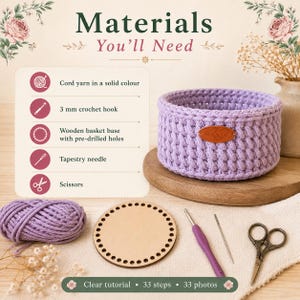 May include: A light purple crochet basket with a brown leather tag labeled Hand Made. The image displays a list of materials including cord yarn, a 3 mm crochet hook, a wooden basket base with pre-drilled holes, a tapestry needle, and scissors.