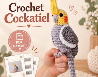 May include: A crocheted cockatiel bird with a yellow crest, grey body, white wing patches, and orange cheek spots. The text "Crochet Cockatiel" and "PDF Pattern" is visible. The bird is shown alongside printed instruction cards featuring photos.