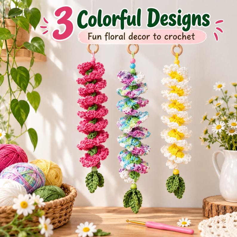 Peut inclure: Trois d&eacute;corations florales en crochet suspendues avec des motifs en spirale rose, multicolore et blanc-jaune. Chaque pi&egrave;ce est suspendue &agrave; un anneau en bois avec des perles color&eacute;es et des feuilles vertes. Texte 3 Colorful Designs Fun floral decor to crochet.