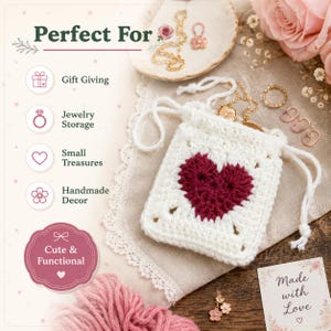 May include: A white crocheted drawstring pouch featuring a dark red heart motif in the center. The text on the image includes "Perfect For," "Gift Giving," "Jewelry Storage," "Small Treasures," "Handmade Decor," "Cute & Functional," and "Made with Love."