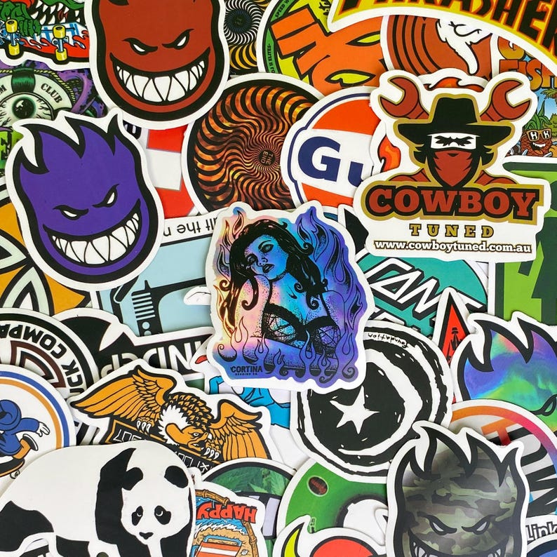 May include: A collection of colorful stickers with various designs. The stickers feature images of a panda, a cowboy, a woman, and a grinning face. Some stickers have text, including "COWBOY TUNED" and "HAPPY".