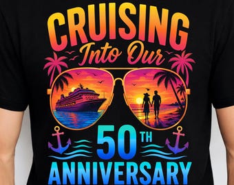 May include: Black t-shirt with a colorful graphic celebrating a 50th anniversary. The design features sunglasses with a cruise ship and a couple on a beach at sunset, with the words "Cruising Into Our 50th Anniversary".