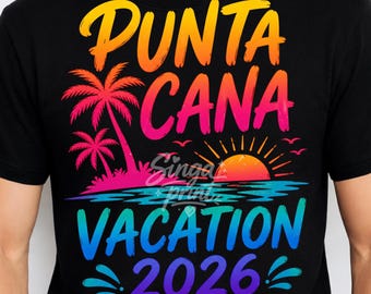 May include: Black t-shirt with a colorful graphic design. The design features the words "Punta Cana Vacation 2026" in a gradient of colors, along with palm trees, a sunset, and the phrase "Let's make memories together."