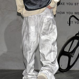 Baggy Denim Jeans | Casual Wide Leg Pants | Y2K Urban Streetwear

Loose wide leg white denim trousers featuring cargo inspired design and oversized silhouette