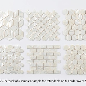 May include: Six distinct sets of white iridescent mother-of-pearl mosaic tiles arranged in a grid. The patterns include diamond, fan, hexagon, oval, rectangular brick, and circular shapes, each featuring a smooth, reflective surface texture.