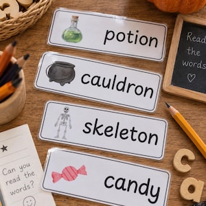 May include: Four rectangular white educational cards featuring black text and illustrations. The cards display the words potion, cauldron, skeleton, and candy, each accompanied by a corresponding graphic of a green liquid bottle, black pot, skeleton, and pink candy.