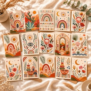 May include: A collection of fourteen rectangular greeting cards featuring colorful illustrations of suns, rainbows, desert landscapes, floral arrangements, and celestial motifs. Each card displays a unique, detailed design with a warm, earthy color palette.
