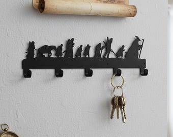 Gancho de pared con silueta de viaje épico, perchero y llavero de la Comunidad del Anillo de fantasía, colgador de metal de la Marcha de la Aventura, llavero de metal de los Compañeros del Mago