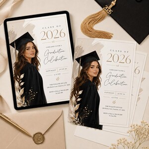 May include: Graduation celebration invitations and a tablet display featuring a graduate in a cap and gown. The invitations read "Class of 2026" and include event details. A tassel and graduation cap are also visible.