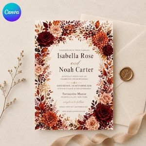 Peut inclure: Une carte d'invitation de mariage rectangulaire sur fond crème avec une bordure florale composée de roses rouge foncé, de dahlias orange et de feuilles d'automne. Le texte indique Isabella Rose et Noah Carter, samedi 10 octobre 2026.