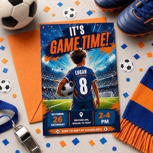 May include: Soccer-themed invitation with the text "IT'S GAME TIME!" and a graphic of a boy holding a soccer ball. The invitation includes the name "Logan", the number "8", and event details. Accompanying items include a soccer ball, cleats, and a scarf.