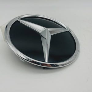 Mercedes-Benz Chrome Raised Star Emblem (Part No. A1648880411) OEM front grille badge