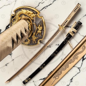 May include: A decorative katana with a gold-colored blade and handle. The hilt features a dragon design, and the scabbard is black with gold accents. The blade is approximately 24 inches long.
