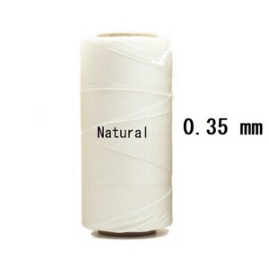 May include: A spool of natural white waxed thread, 0.35 mm thick.