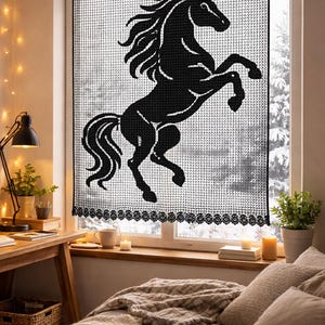 May include: Black horse silhouette curtain panel. The curtain features a rearing horse design against a white background. The panel is hung on a black rod above a window, with a lace trim at the bottom. The room has a bed, desk, and plants.