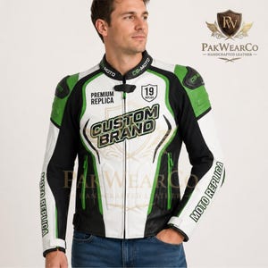 A model wearing a green, black, and white PakWearCo leather motorcycle jacket, posing for a product showcase.