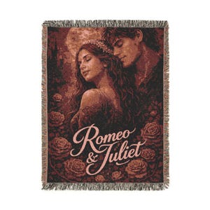 May include: A woven throw blanket featuring a romantic illustration of Romeo and Juliet. The artwork depicts a couple with a full moon in the background, surrounded by roses. The words "Romeo & Juliet" are written in a cursive font.