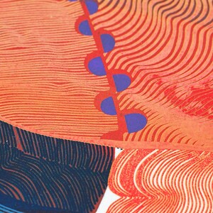 May include: Abstract artwork featuring a vibrant composition of colors and textures. The image showcases a blend of orange, red, blue, and white hues, with a focus on curved lines and geometric shapes. The design includes a series of purple half-circles.