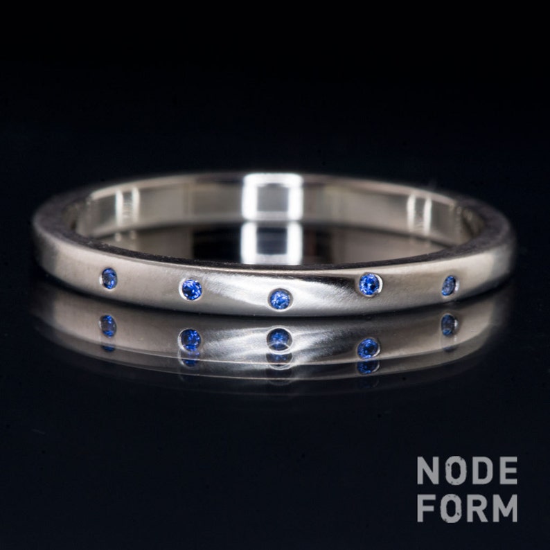 Narrow Random Ceylon Blue Sapphire Wedding Band in Platinum image 0