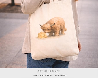 Bolso de lona con estampado de vaca de las Tierras Altas y panqueques, ideal para amantes del desayuno.