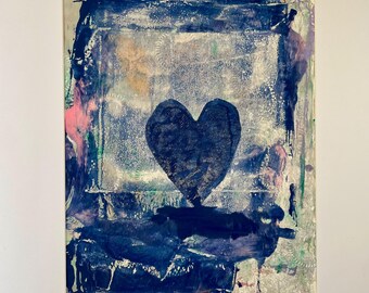 May include: Abstract mixed media artwork with a dark blue heart shape on a textured background. The artwork uses shades of blue, white, pink, and green, with visible brushstrokes and layered textures. The piece is mounted on a white mount.