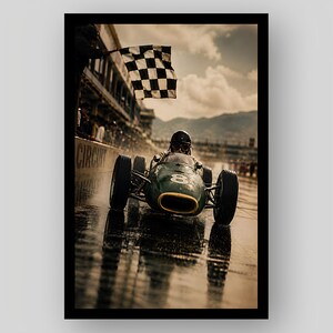 May include: A vintage green race car with the number 8 on its hood drives on a wet track. A person in the background waves a black and white checkered flag. The car has a yellow-rimmed air intake and the driver wears a helmet and goggles.