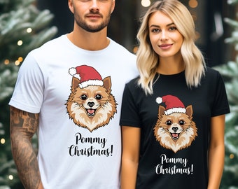 May include: Two white t-shirts with a cartoon image of a Pomeranian dog wearing a Santa hat. The text "Pommy Christmas!" is printed on the shirts.