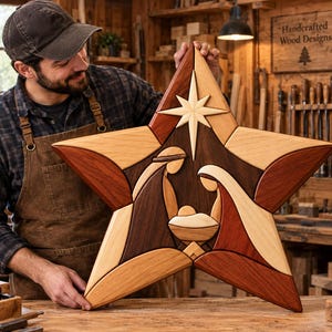May include: A large, five-pointed star-shaped wooden wall art piece featuring a nativity scene inlay. The design uses various shades of natural wood, including light, medium, and dark tones, to depict figures around a central manger and a star.