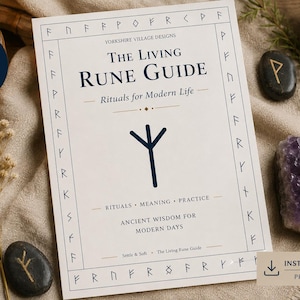 May include: A book titled "The Living Rune Guide" with a dark blue rune symbol, surrounded by other runes. The image includes a candle, crystals, and dried flowers, suggesting a spiritual or mystical theme.