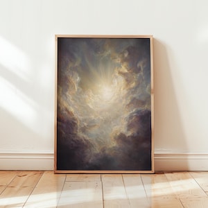 May include: Framed artwork depicting a celestial scene. The image features a bright, radiant light emanating from the center, surrounded by swirling clouds in shades of purple, gold, and white. The artwork is encased in a wooden frame.