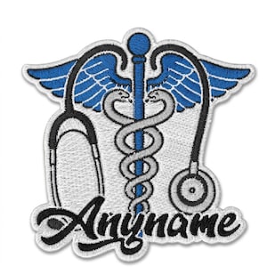 May include: An embroidered patch featuring a blue caduceus symbol with two grey snakes intertwined around a central staff, flanked by a black stethoscope. The word Anyname is stitched in black cursive script across the bottom of the design.