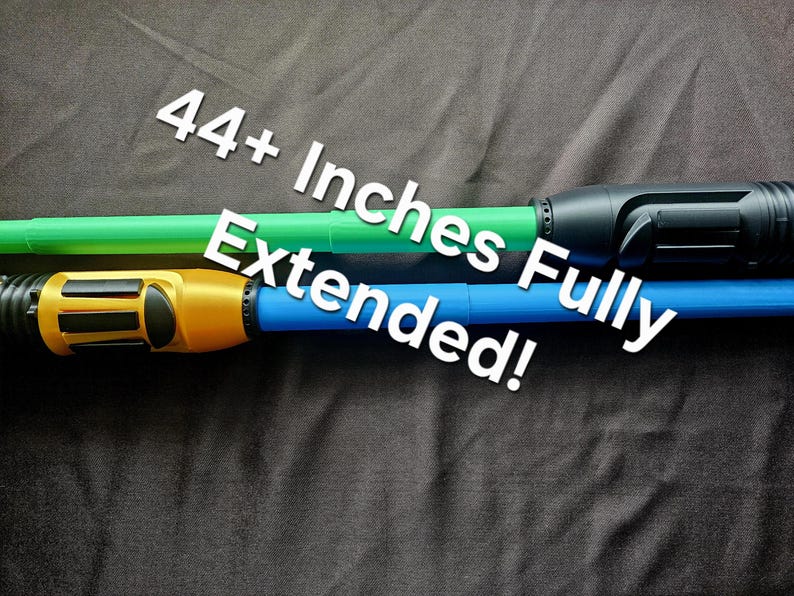 May include: Two extendable toy swords, one with a green blade and black hilt, the other with a blue blade and gold hilt. The text 44+ Inches Fully Extended! is printed across the image, indicating the length of the toys when fully expanded.
