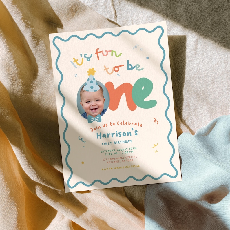 The image is a birthday invitation for a baby's first birthday celebration.