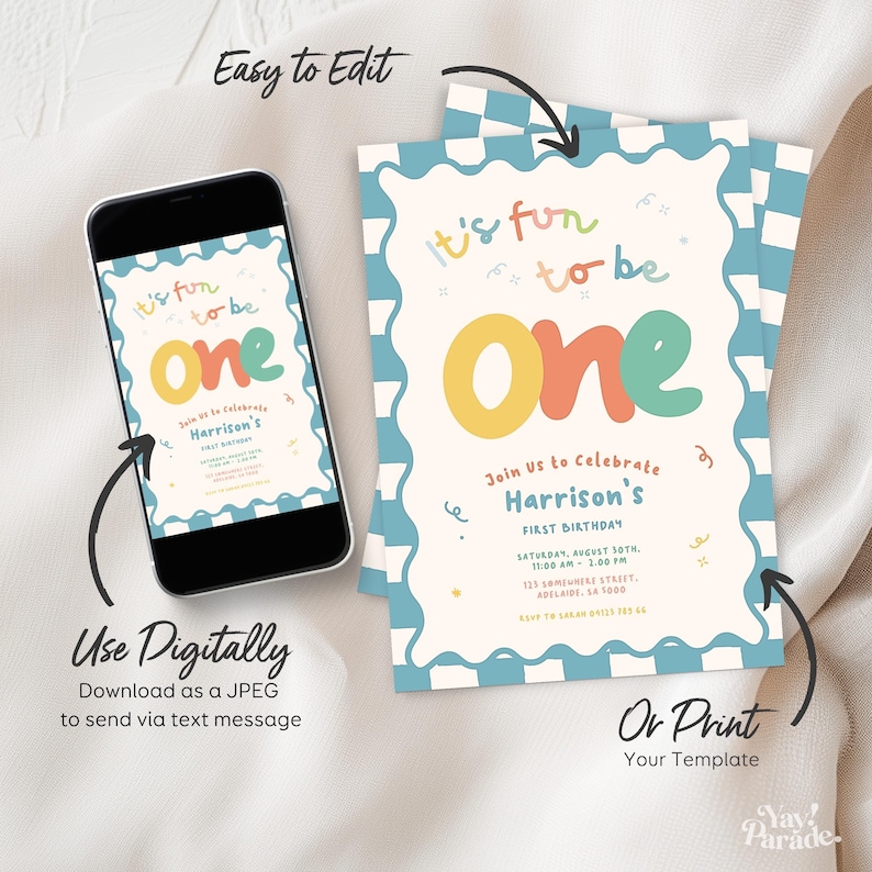 a birthday invitation for a one-year-old, with a mobile phone and a printed version of the invitation. The invitation is for a celebration of Harrison's first birthday.
