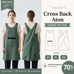 Può includere: Un cartamodello per un grembiule con schiena incrociata intitolato Cross Back Aton. Il modello include un grembiule verde con una tasca nera, mostrato di fronte e di dietro, insieme a un disegno al tratto, etichette taglie XS, XL, 2XL e testo.