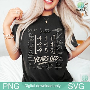 May include: A black short-sleeve t-shirt featuring a white graphic print of various mathematical formulas, geometric shapes, and a central matrix of numbers arranged in three rows and three columns, with the text YEARS OLD printed below.