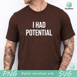 May include: A brown t-shirt with the white text "I HAD POTENTIAL". The shirt is a crew neck style and appears to be made of a soft material. The image also includes the text "PNG Digital download only SVG".