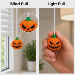 May include: A blind pull and a light pull, each featuring an orange pumpkin-shaped handle with a green stem and a carved black jack-o'-lantern face. The pumpkin is attached to a white braided cord, shown hanging and being held by a hand.