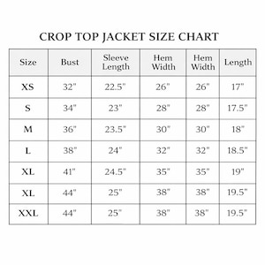 May include: A size chart for a crop top jacket, with measurements in inches. The chart includes sizes XS to XXL, with bust, sleeve length, hem width, and length measurements for each size. The text "CROP TOP JACKET SIZE CHART" is at the top.