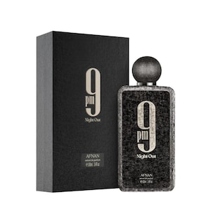 May include: A rectangular black perfume bottle and matching box featuring the text 9 pm Night Out and Afnan extrait de parfum 100ml 3.4fl oz. The bottle has a textured black surface and a round black cap, while the box is a solid matte black.
