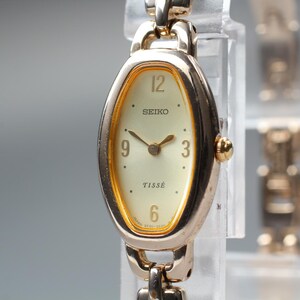 Near MINT] SEIKO Tisse 2E20-7110 Pink Gold Oval Quartz Woman's Bracelet Watch