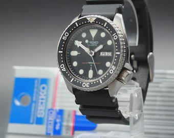 Near MINT] SEIKO 7548-7000 150m Diver's Black Boy 42mm Quartz Men's Watch JAPAN