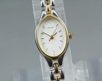 Near MINT] SEIKO Tisse 1F21-5A00 White Dial Oval bracelet Quartz Woman's Watch